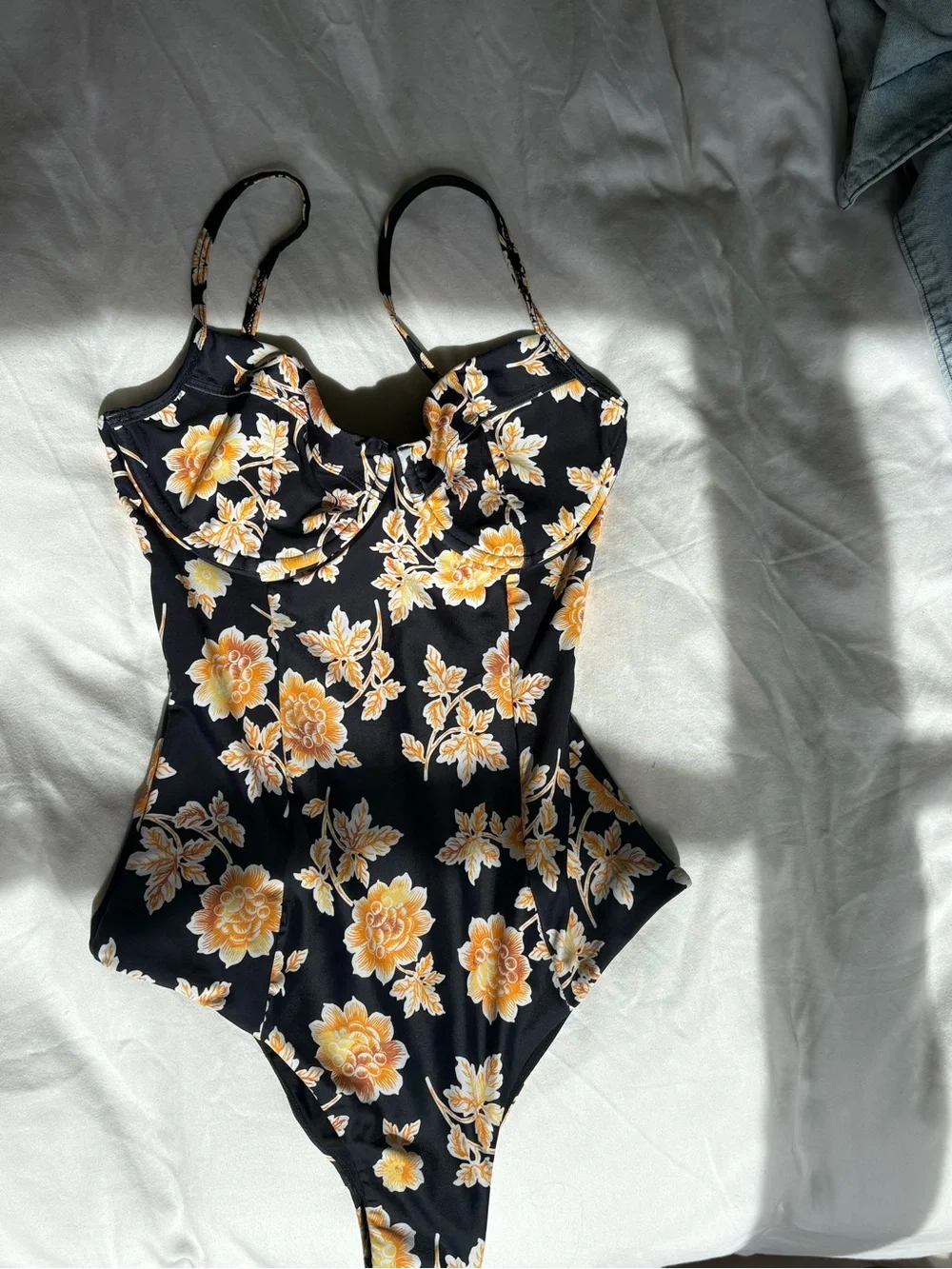 Auguste The Label Black One-Piece Bodysuit with Yellow Floral Print